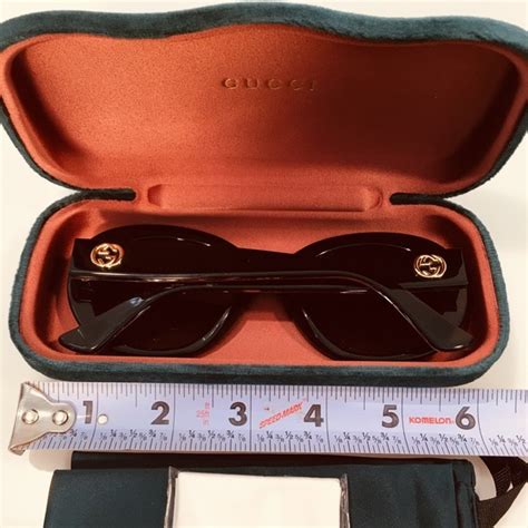 brand new gucci case sunglasses.